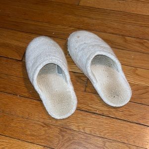 Well Worn white slippers